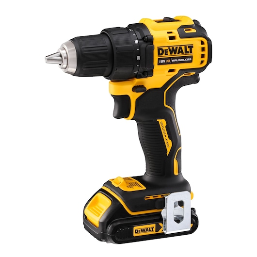 Yellow and black DEWALT cordless drill with brushless motor and battery attached.