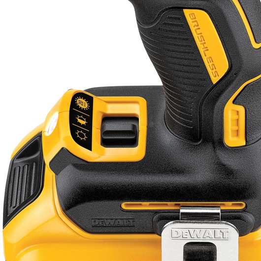 Close-up of DEWALT brushless drill handle and control, showing light settings and clip.