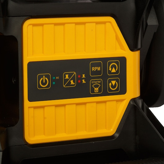 Close-up of DEWALT control panel with buttons and indicator lights on a yellow device.