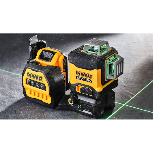 DEWALT laser level tool for precise measurements, featuring 12V/18V compatibility and visible green laser lines.