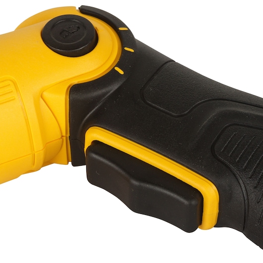 Close-up of the handle and trigger of a DEWALT yellow and black power tool.