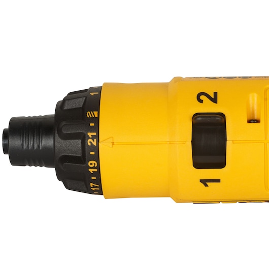 Close-up of the front and selector switch of a yellow DEWALT DCF008 drill.