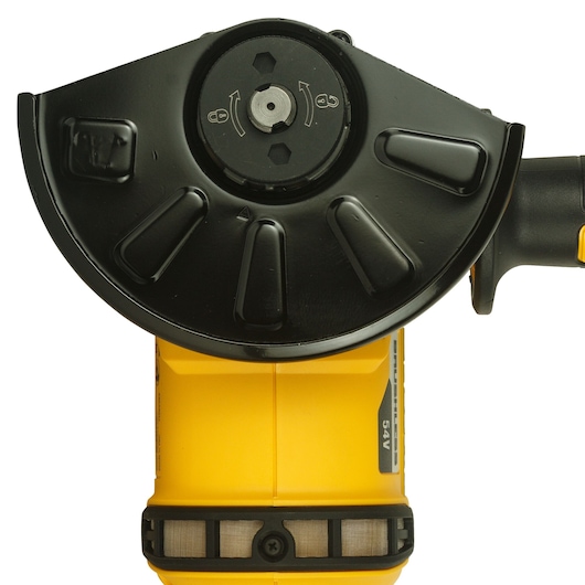 Top view of a DEWALT 54V cordless angle grinder, showing the blade guard and handle.