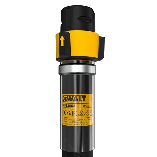 Close-up of DEWALT DCPS3505 tool handle with yellow details and product label visible on metal surface.