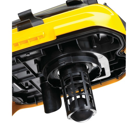 Close-up of the DEWALT DCV582 vacuum filter component in black and yellow casing.