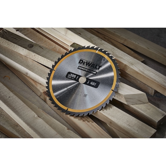 DEWALT circular saw blade DT1959 for construction, shown on wooden beams.