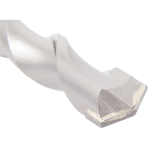 Close-up of a DEWALT masonry drill bit tip with a silver, spiral design, suited for tough materials.