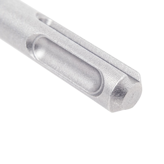 Close-up of a metallic drill bit with grooves. Tool accessory for DEWALT power tools.