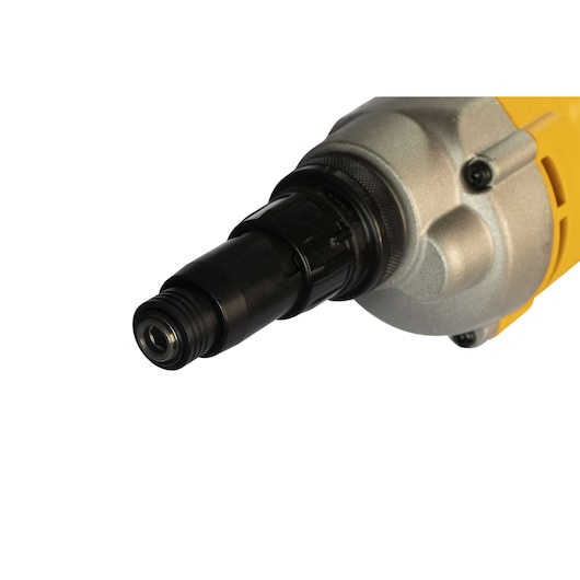 Close-up of the tip of a DEWALT DW268 power tool with a black and metallic finish, partially shown.