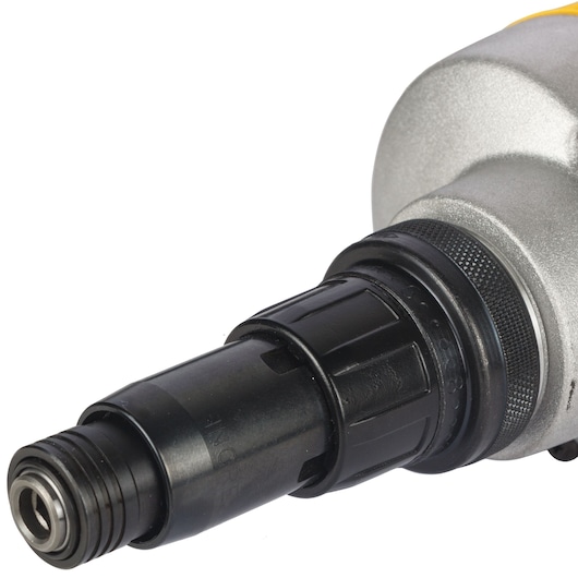 Close-up of a DEWALT DW268 power tool, showing the front section and chuck attachment.