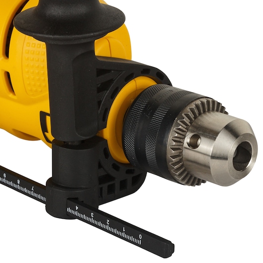 Close-up of DEWALT drill handle and chuck. SKUs: DWD024-QS, DWD024. Photography product category.