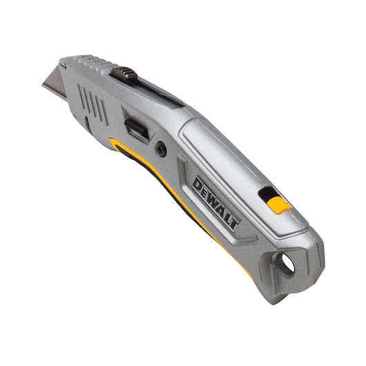 Silver DEWALT utility knife with a retractable blade and ergonomic handle, angled view on white background.