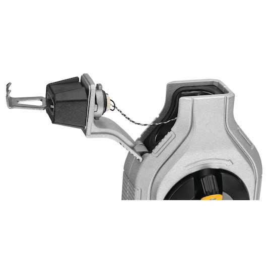 Close-up of a DEWALT chalk line reel, showing the string and handle mechanism.