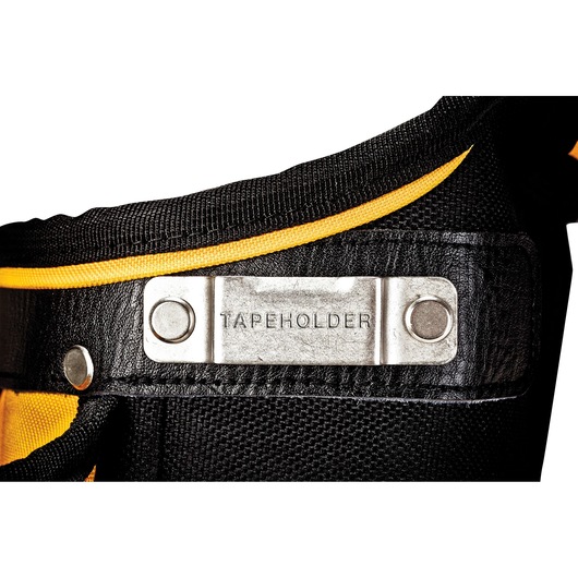 Close-up of a metal tape holder attached to a black and yellow tool belt or pouch.