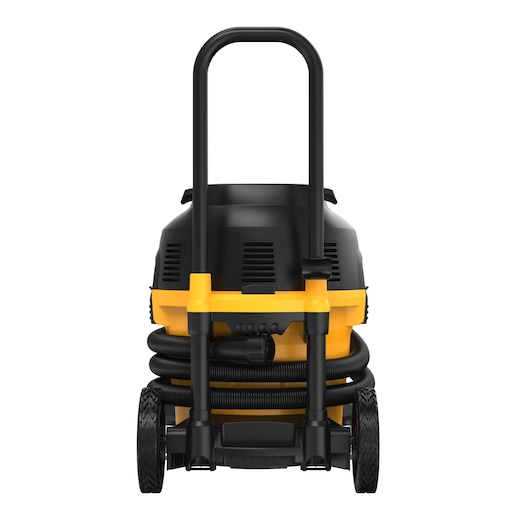 A DEWALT DWV905M industrial vacuum cleaner shown from the front, featuring a yellow and black body, large wheels, a sturdy handle, and hoses wrapped around the base.