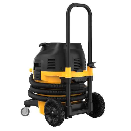 A DEWALT industrial vacuum cleaner with a black and yellow body, large wheels, a handle for easy transport, and a coiled hose attached around the unit. The vacuum is designed for heavy-duty cleaning.